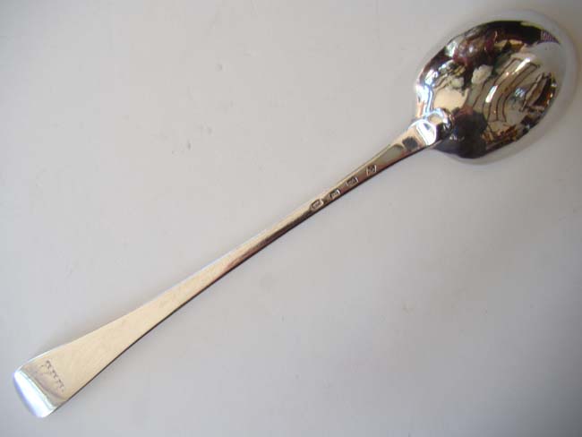 A rare and exceptionally large George I period silver Stuffing Spoon by Jane Lambe, London, 1723